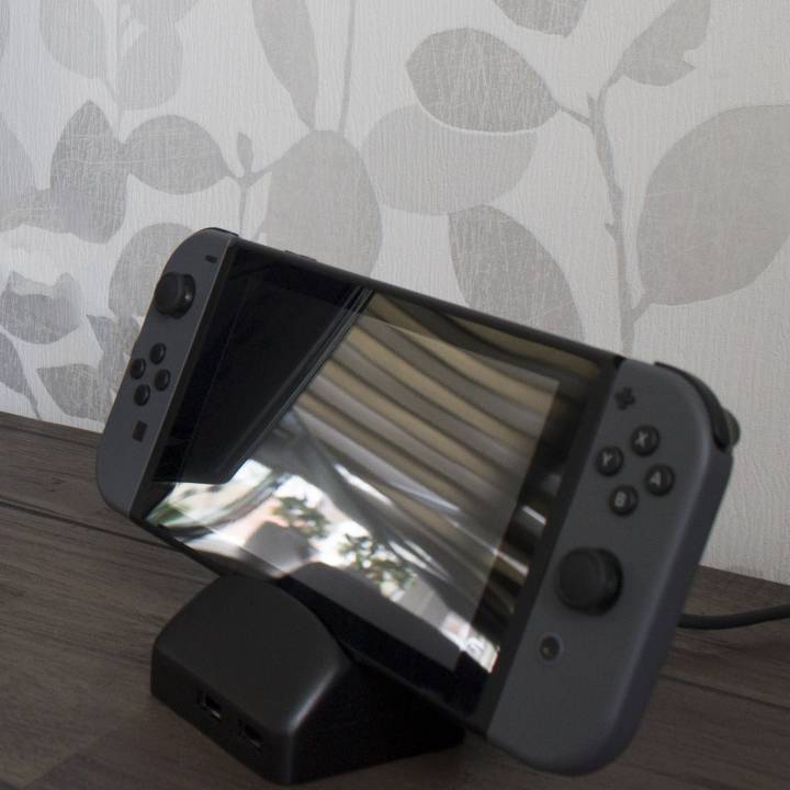 Custodia dock portatile per Nintendo Switch caricata a molla