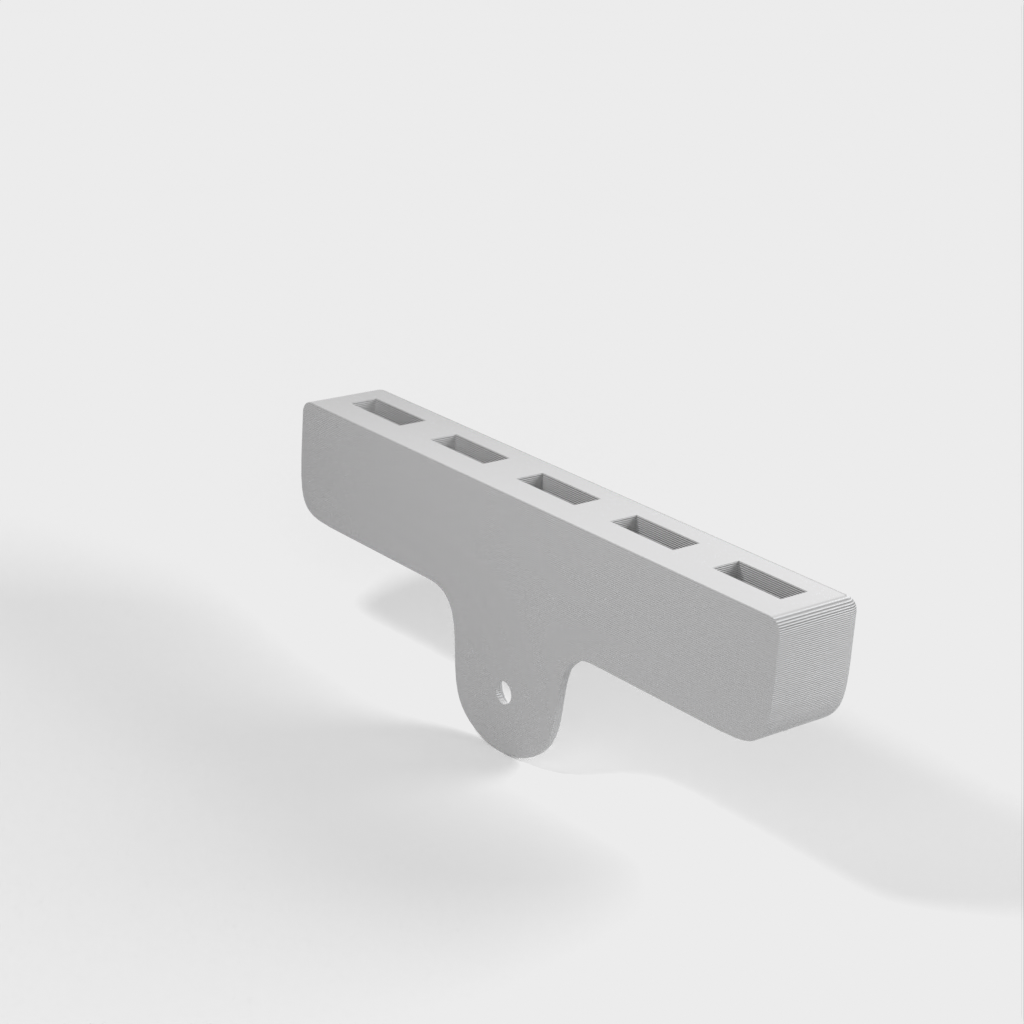 Supporto a parete per cavi USB con 5 slot