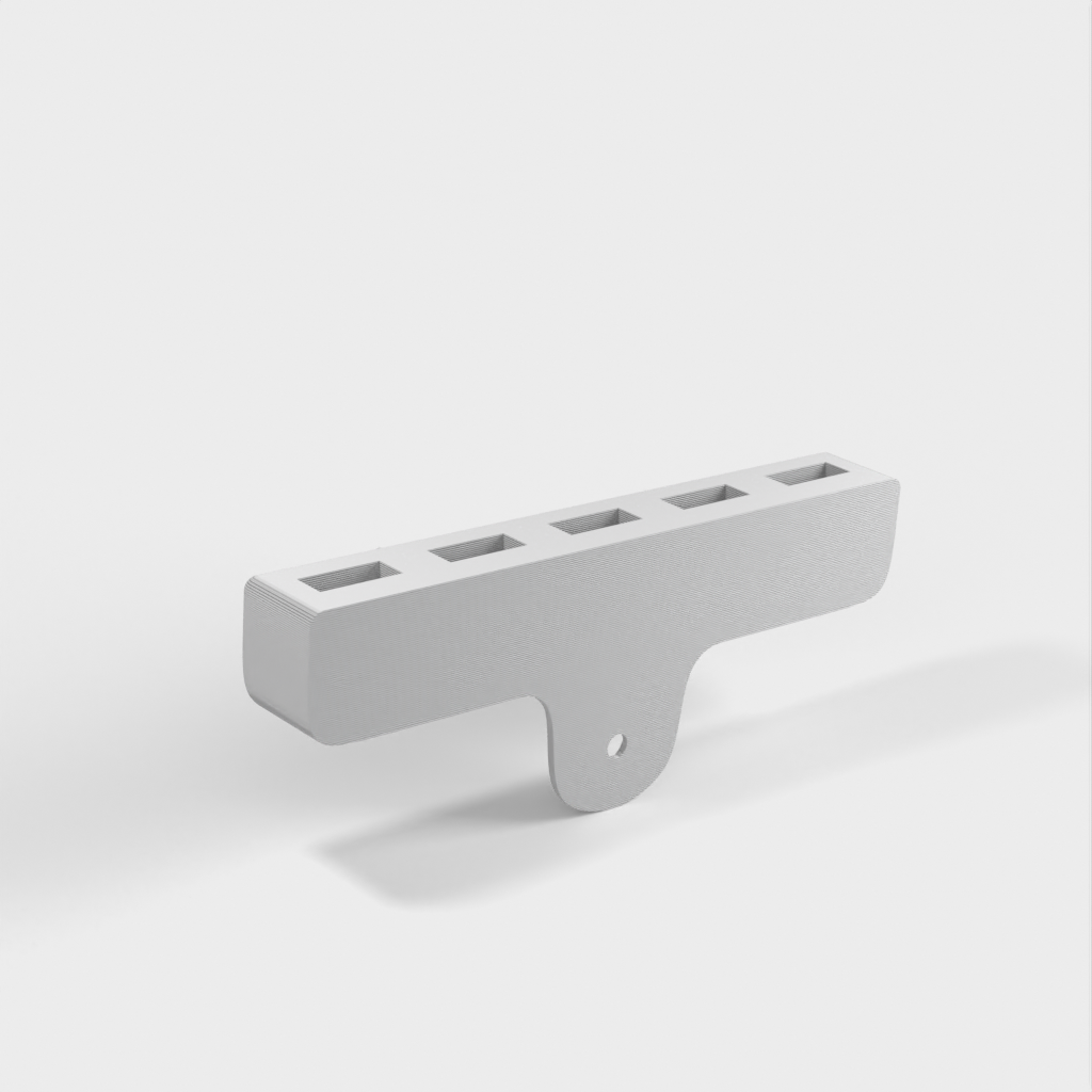 Supporto a parete per cavi USB con 5 slot