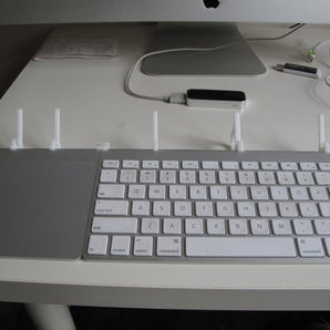 Supporto semplice per iPhone e iPad con integrazione per tastiera e trackpad wireless Apple