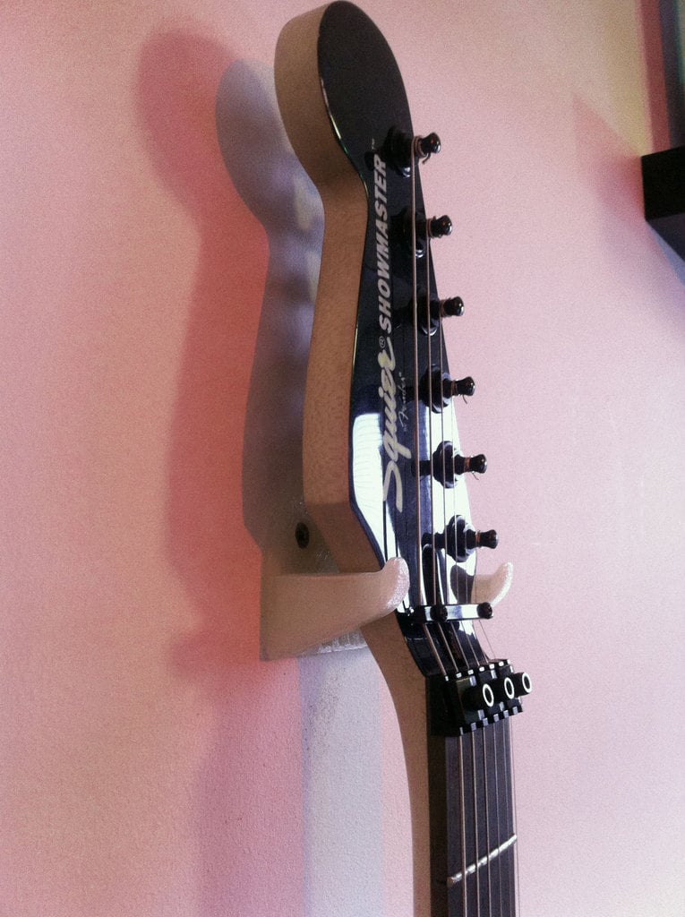 Supporto a parete per chitarra