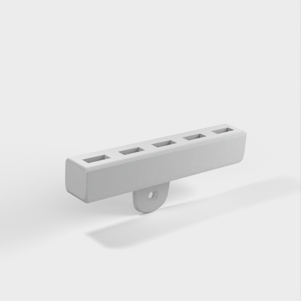 Supporto a parete per cavi USB con 5 slot
