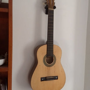 Supporto a parete per chitarra
Design robusto per modelli acustici ed elettrici