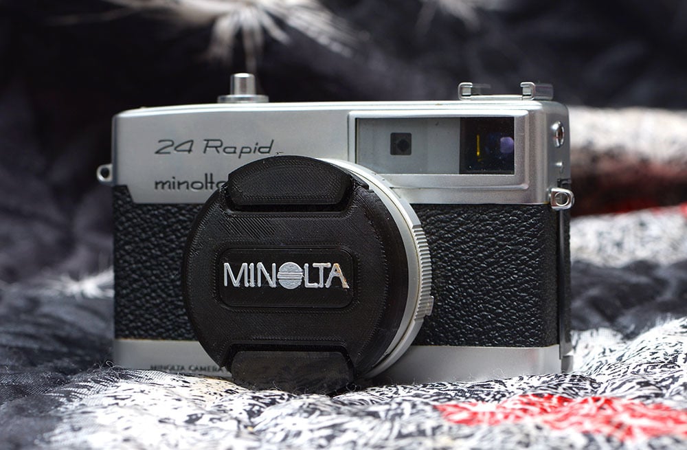 Copriobiettivo fotocamera da 54 mm per NIKON / CANON / MINOLTA / Tutti i modelli