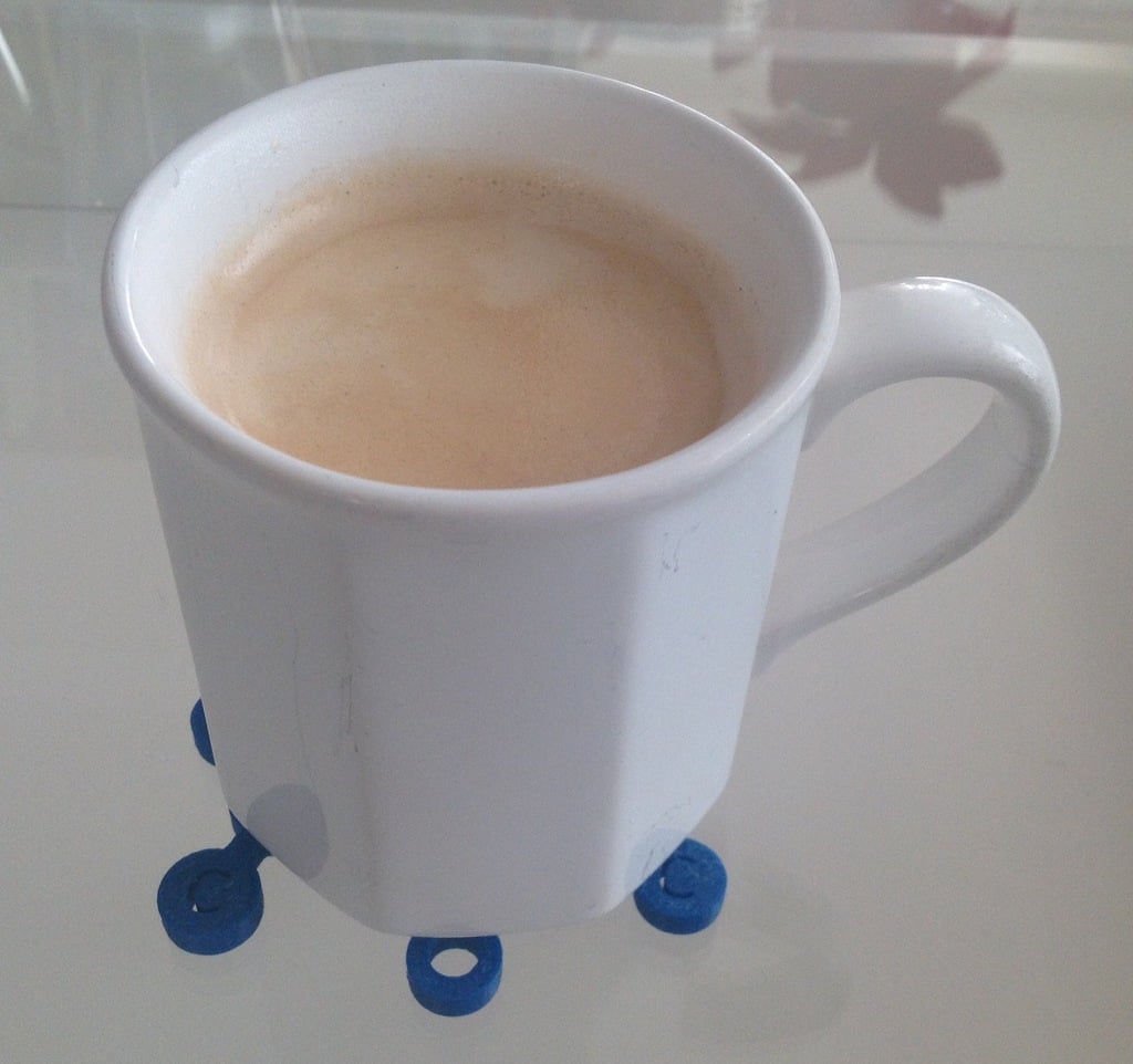Tovaglietta con molecola di caffeina per tazze da caffè