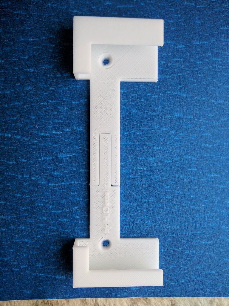 Supporto da parete flessibile per tablet con clip angolare sicura