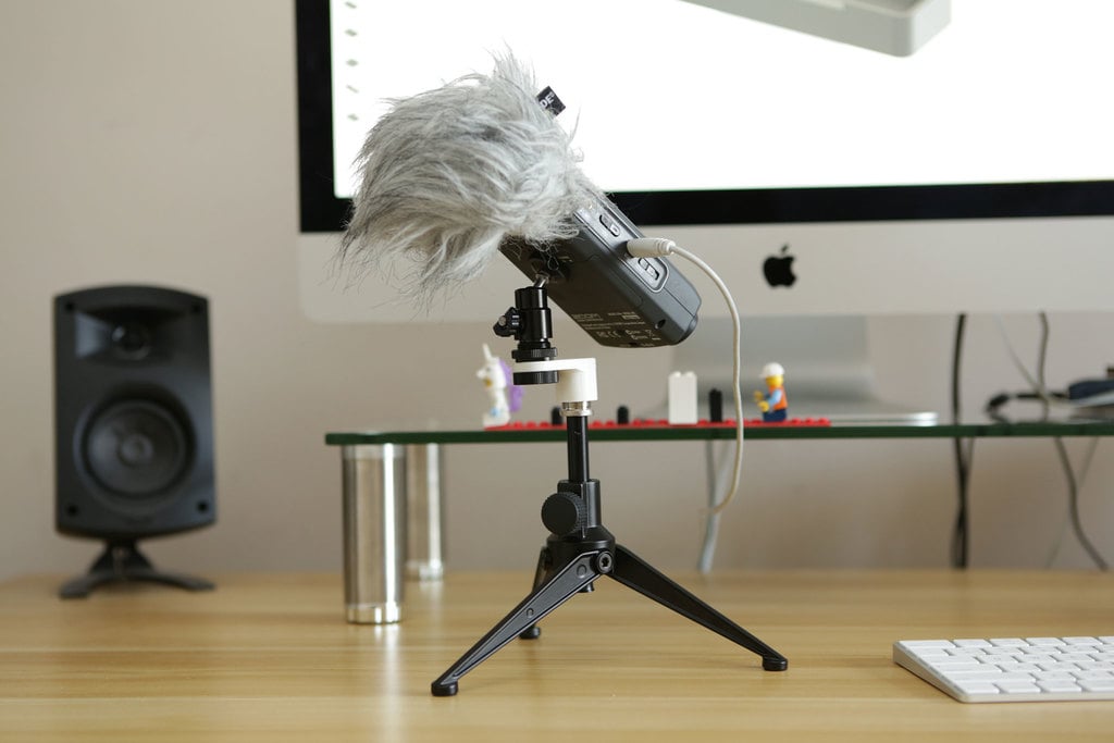 Adattatore Mic2Cam per convertire un supporto per microfono in un treppiede per fotocamera