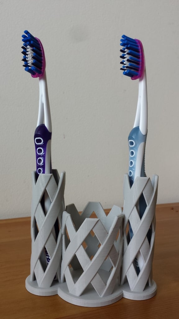 Portaspazzolino con spazio per 1-4 spazzolini e scatola integrata per gli attrezzi