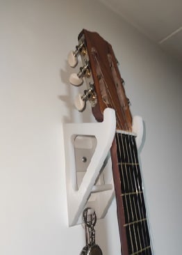 Base a muro per appendere la chitarra