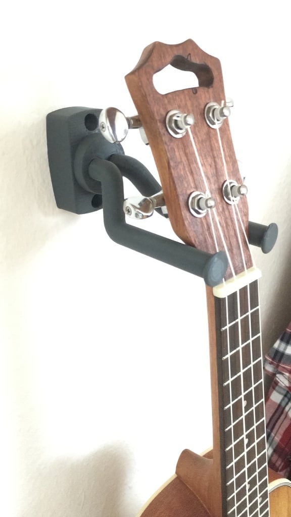 Supporto da parete universale per chitarra con fissaggio a gravità e parti mobili