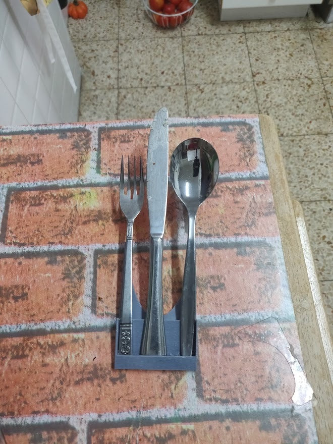 Coltello, cucchiaio e forchetta per la cucina