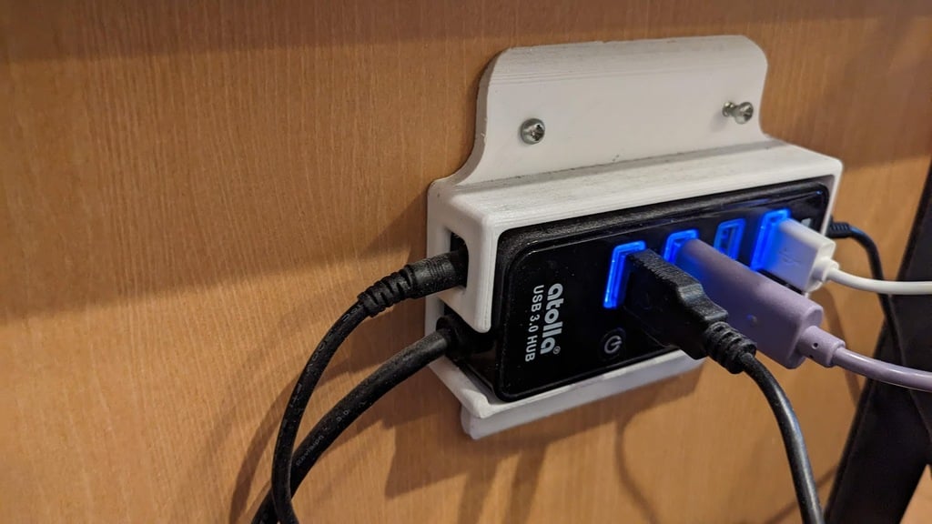 Supporto da parete per hub USB Atolla