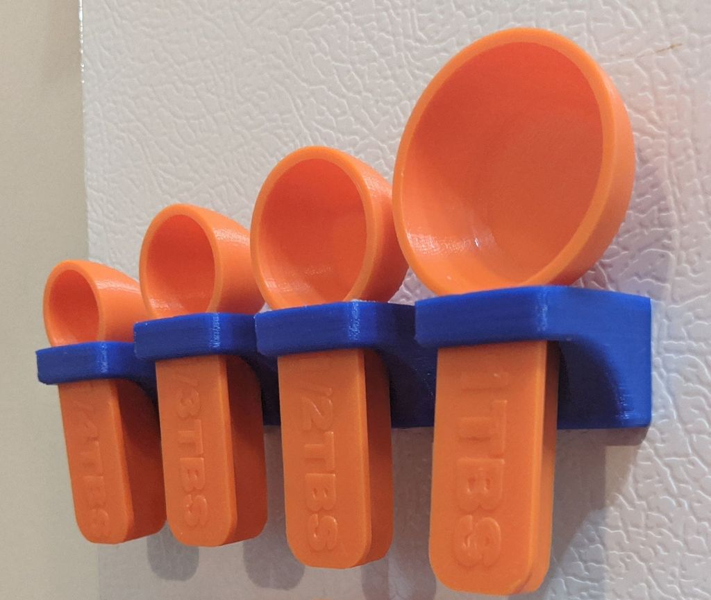 Cucchiai dosatori con supporti magnetici per una facile pulizia e conservazione in frigorifero