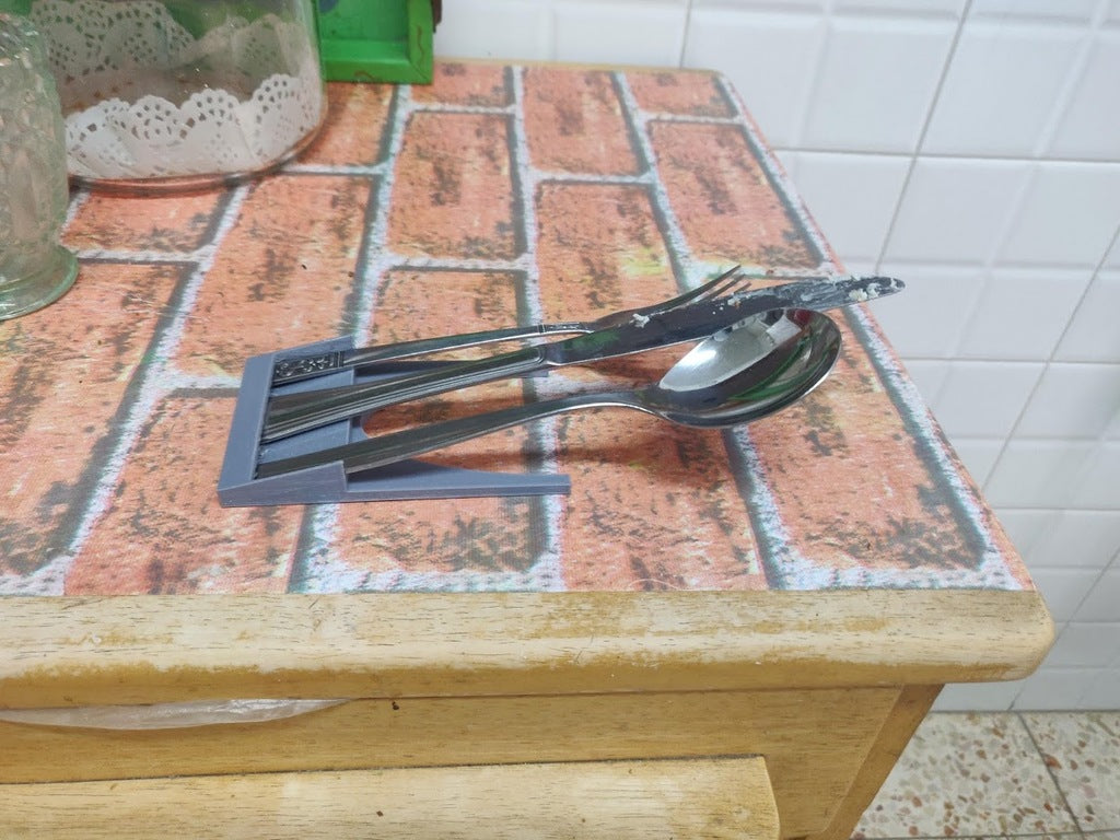Coltello, cucchiaio e forchetta per la cucina